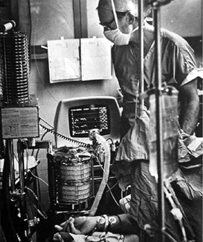 The author in the operating room with a terminal of the mass spectrometer system displaying the time courses of end tidal PCO2 and halothane anesthetic in his patient
